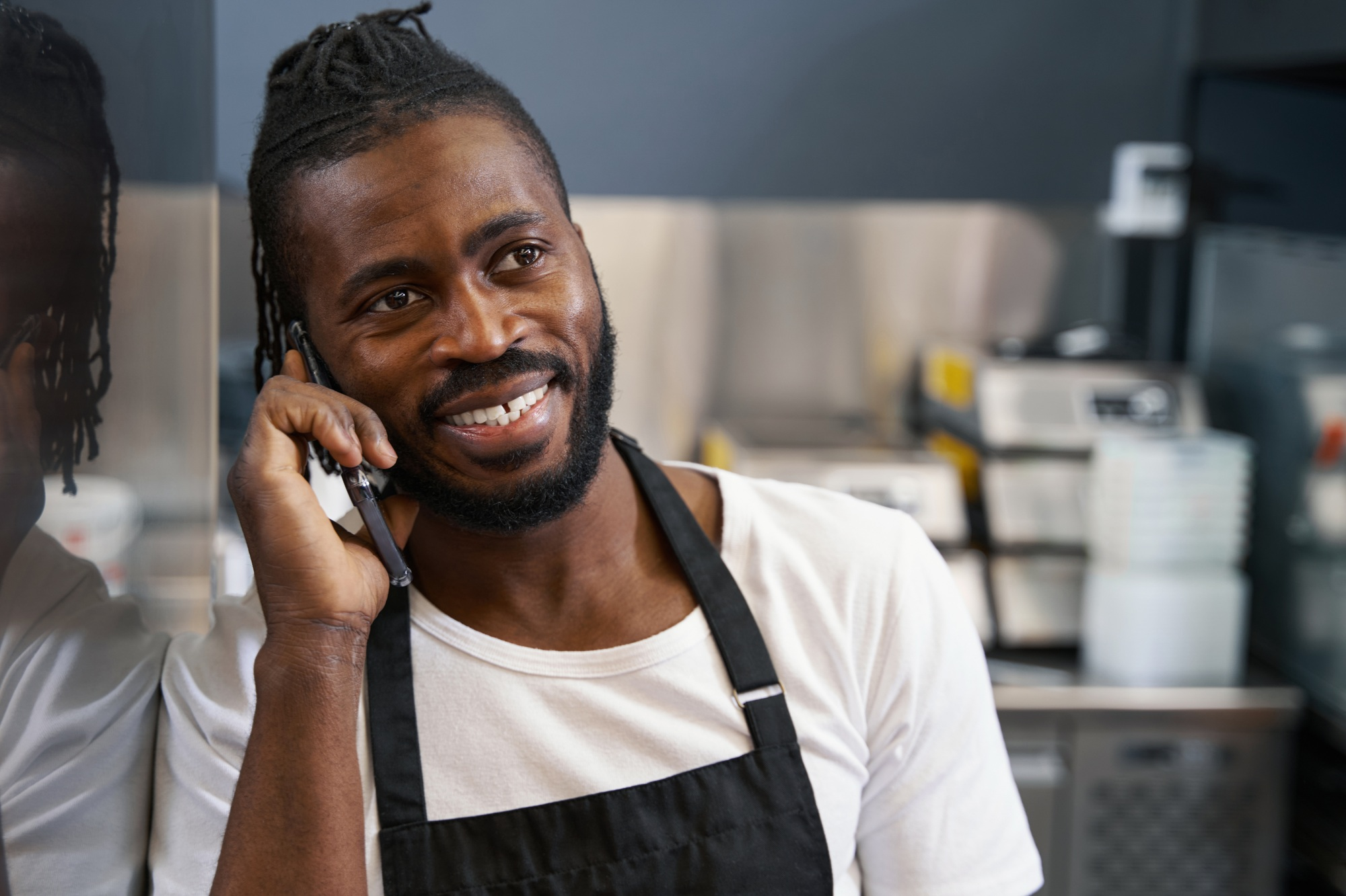 Chef talking on the phone at work